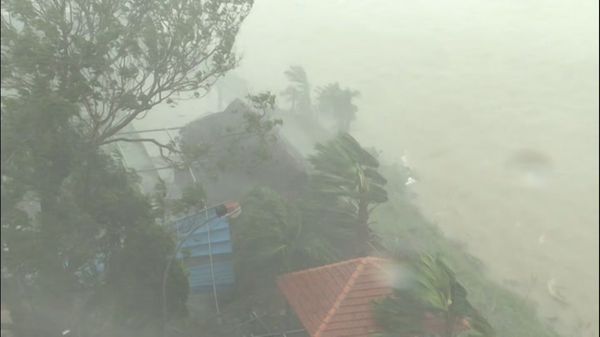 Tropical storm's heavy wind and rain pound Vietnam | wusa9.com