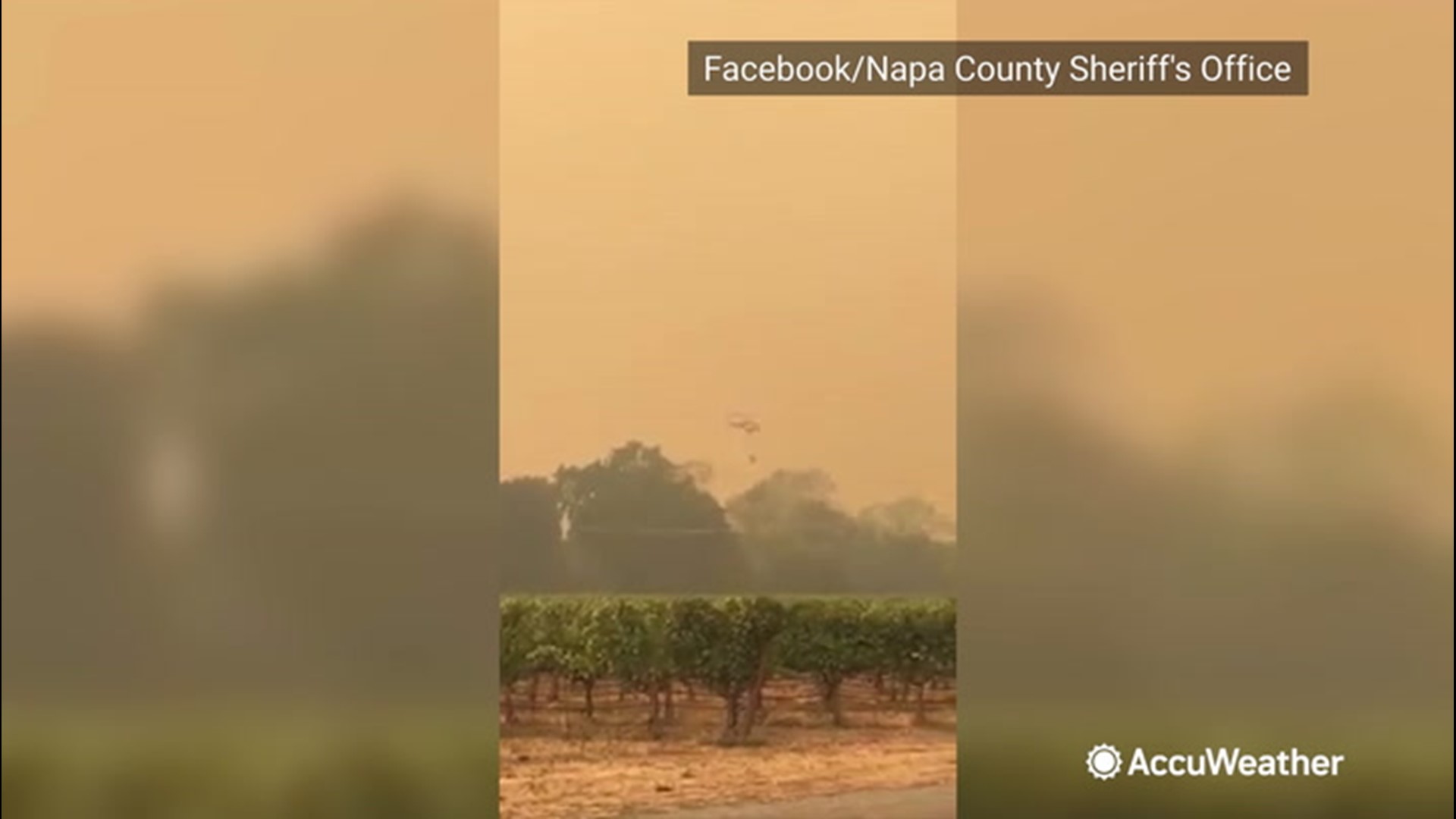 Videos shared by the Napa County Sheriff's Office show emergency crews battling the Glass Fire from the air in Napa County, California, on Sept. 28.