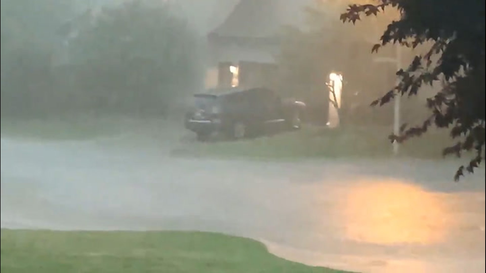 Families in Tulsa, Oklahoma, saw heavy rain and flooding as a tornado-warned storm passed over the city on April 28.