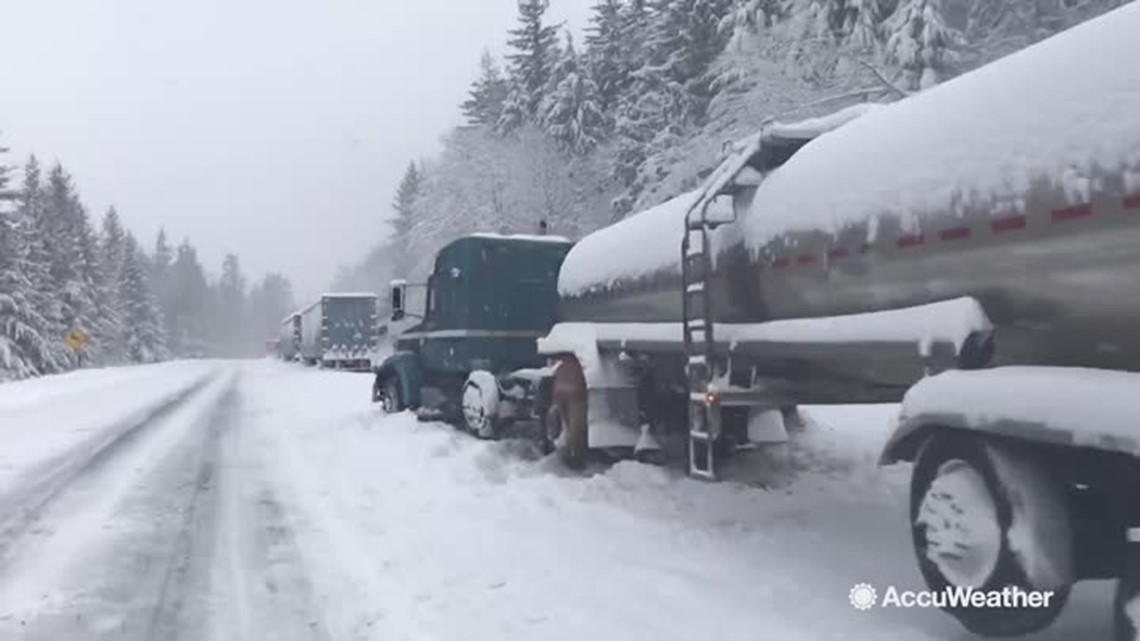 Semi-trucks stuck in the snow line Interstate 90  wusa9.com