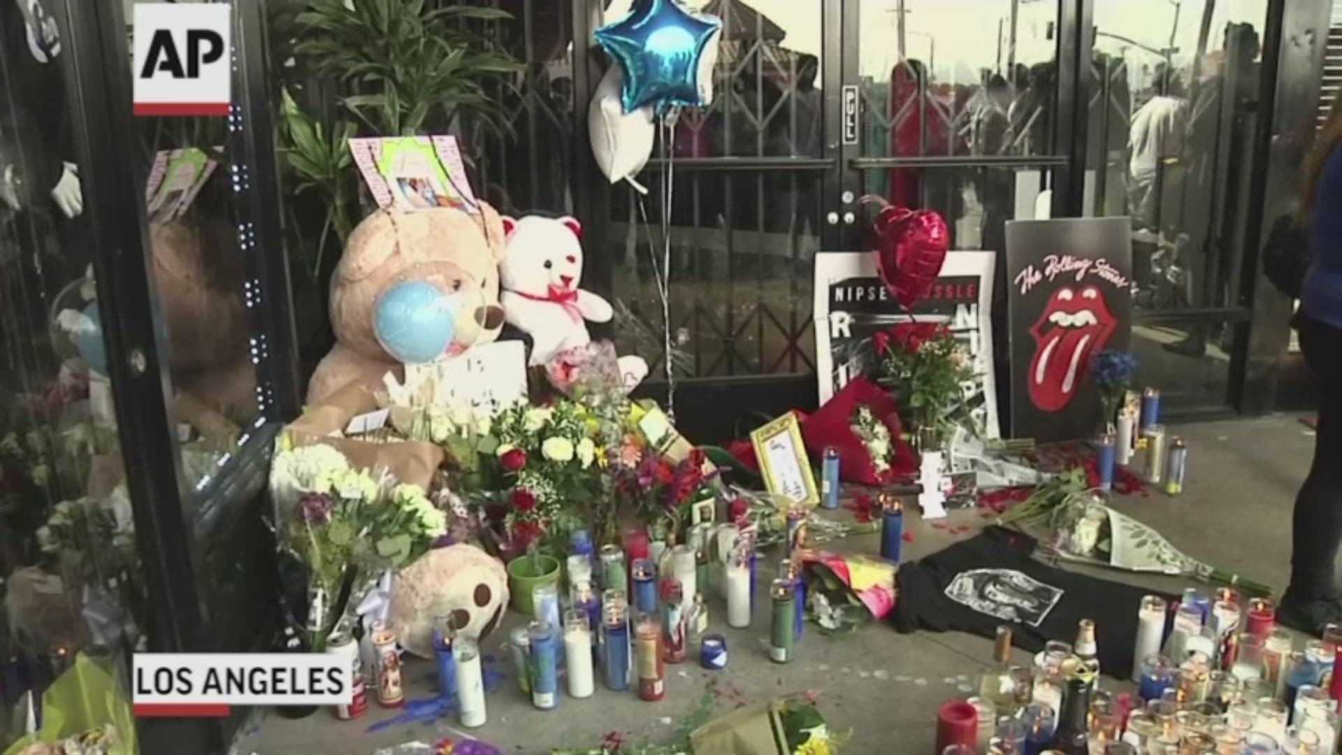 Rapper Nipsey Hussle, who was shot and killed Sunday night outside of his Los Angeles clothing store, is being remembered for giving back to his community.  (AP)