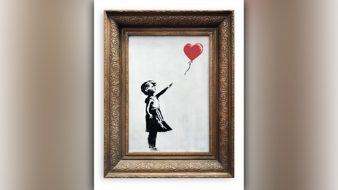 Banksy artwork self-destructs just after $1.4 million sale | wusa9.com