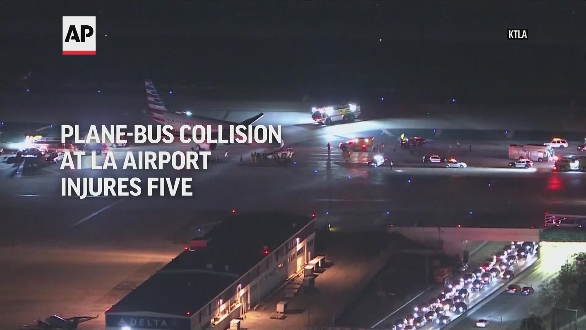 The jet was being towed on a taxiway when it collided with a shuttle bus, which was carrying passengers between terminals.