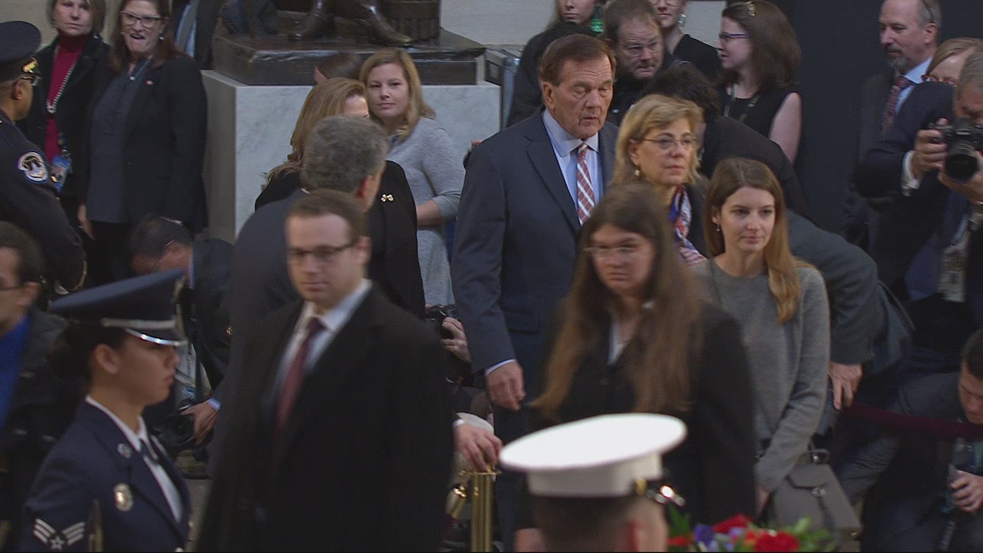 Former President George H.W. Bush's service dog joined those who paid respect and visited Bush's casket in the Capitol Rotunda Tuesday during a day of public viewing.
