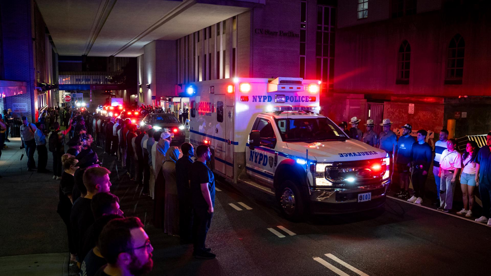 A man stalked through a Manhattan office tower firing a rifle Monday, killing four people, including a New York City police officer.