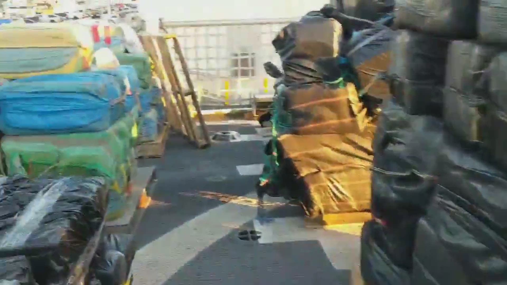 The US Coast Guard's 7th District shared video of the 27,000 pounds of seized cocaine that will be offloaded Friday and sent for destruction.
