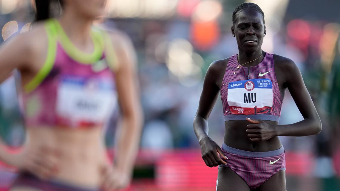 Olympic champ Athing Mu’s hopes for repeat title end after fall | wusa9.com