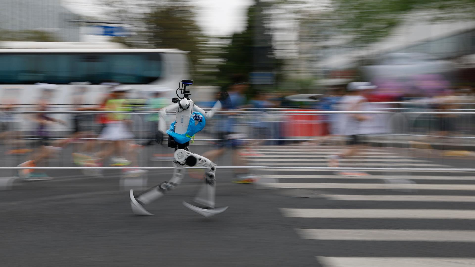Winner of half-marathon race for robots finishes with faster time than ...