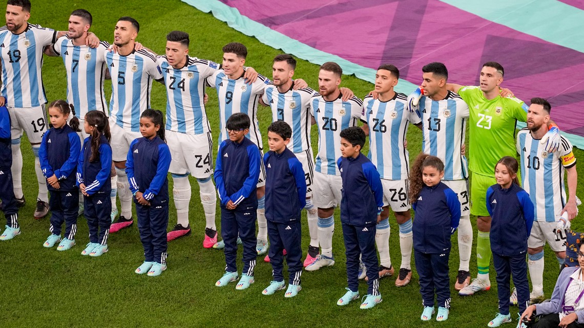 Why do soccer players walk onto the field with kids?