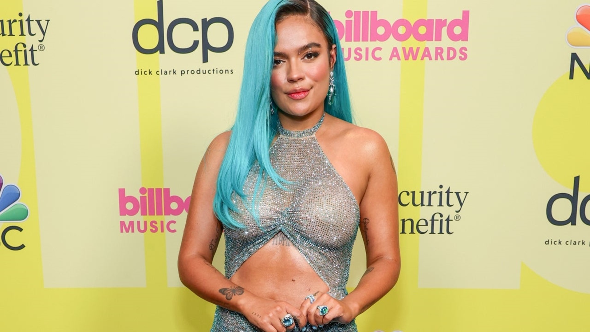 Karol G Rocks Stunning Sheer Gown and Bright Blue Hair at 2021