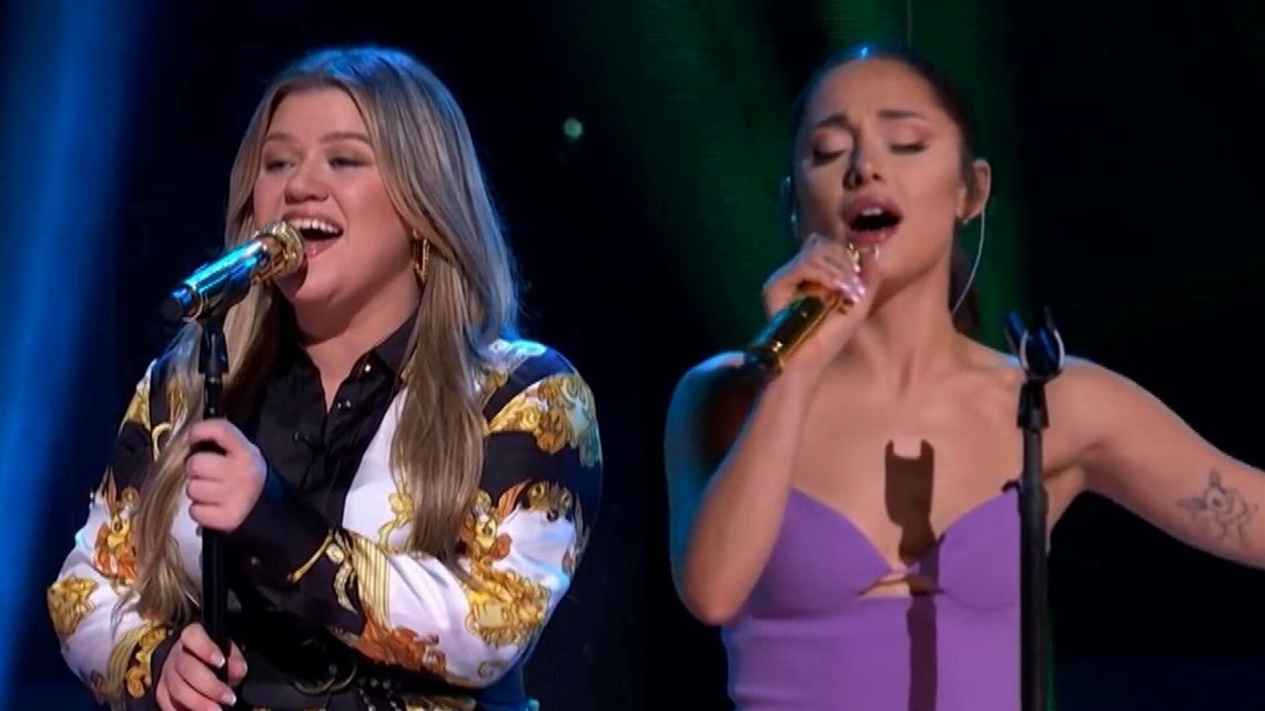 Kelly Clarkson and Ariana Grande Talk Performing 'Santa, Can't You Hear Me' For the First Time | wusa9.com