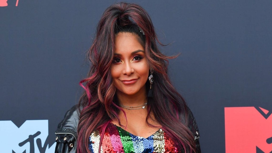 Photos from Snooki Explains Her Jersey Shore Fashions