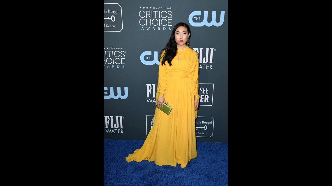 awkwafina gold dress Awkwafina wears a gold pleated dress to the Met Gala 2019