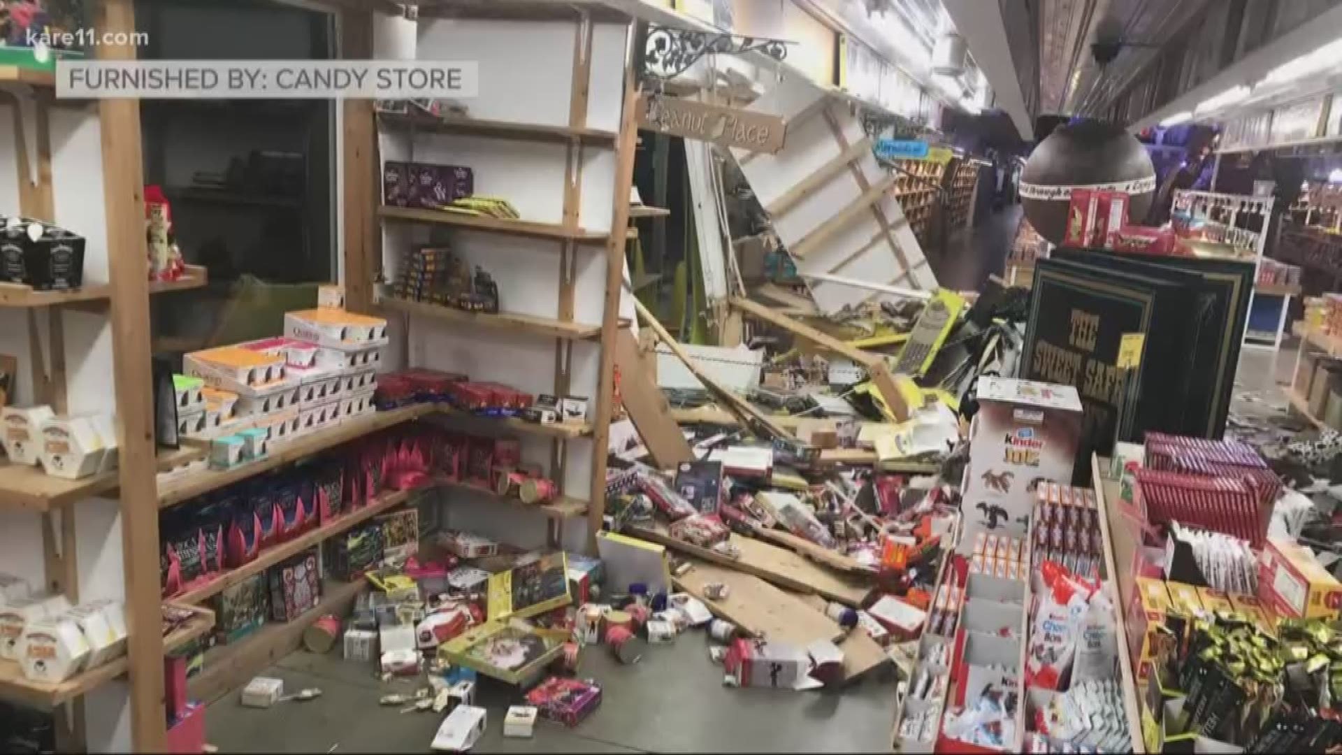 Employees are fixing and cleaning up their store after a car crashed into Minnesota's Largest Candy Store in Jordan.