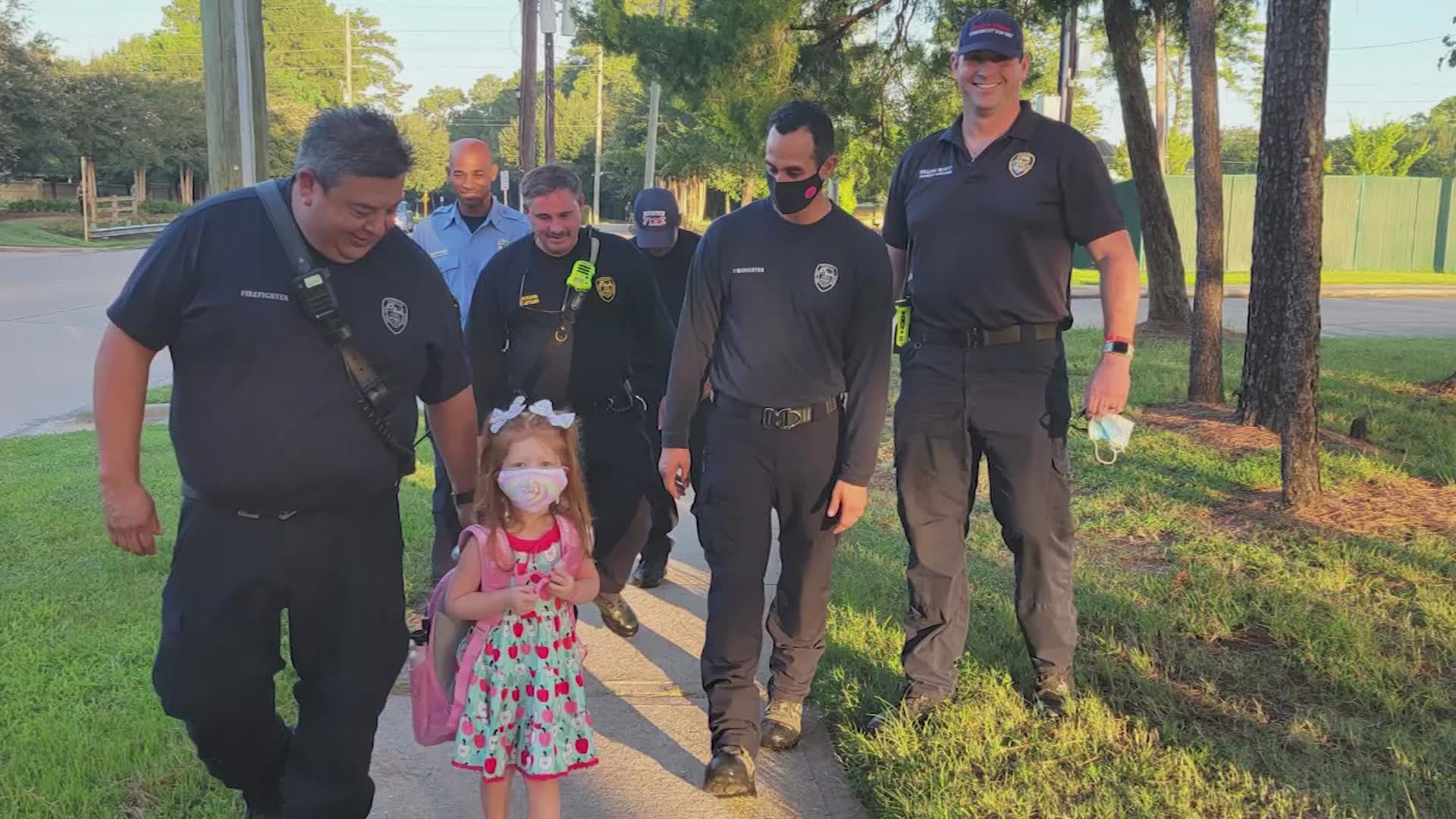 Firefighters stepped in for one of their own fighting COVID-19, escorting his daughter to her first day of kindergarten.