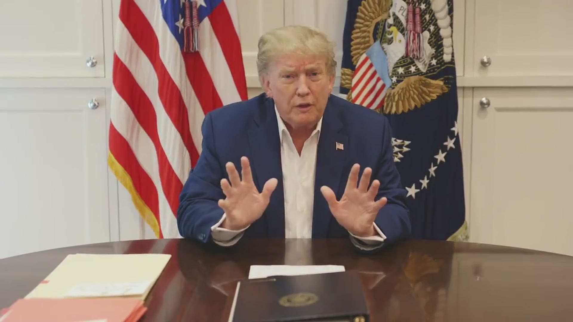 President Donald Trump released a video message Saturday evening while he remains hospitalized at the Walter Reed Medical Center.