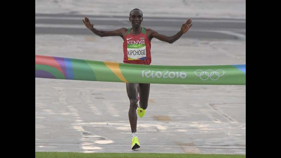 Eliud Kipchoge Of Kenya Wins Men's Marathon; USA's Galen Rupp Takes ...