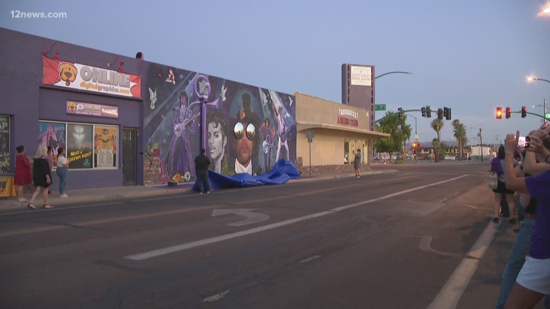 Local artist unveils Prince mural on Grand Avenue in Phoenix