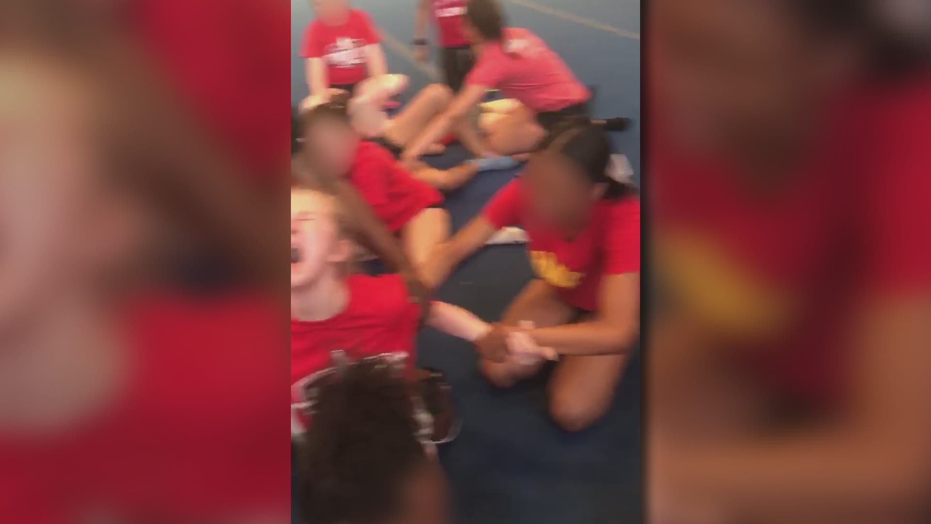 Videos Show Cheerleaders Repeatedly Forced Into Splits Police