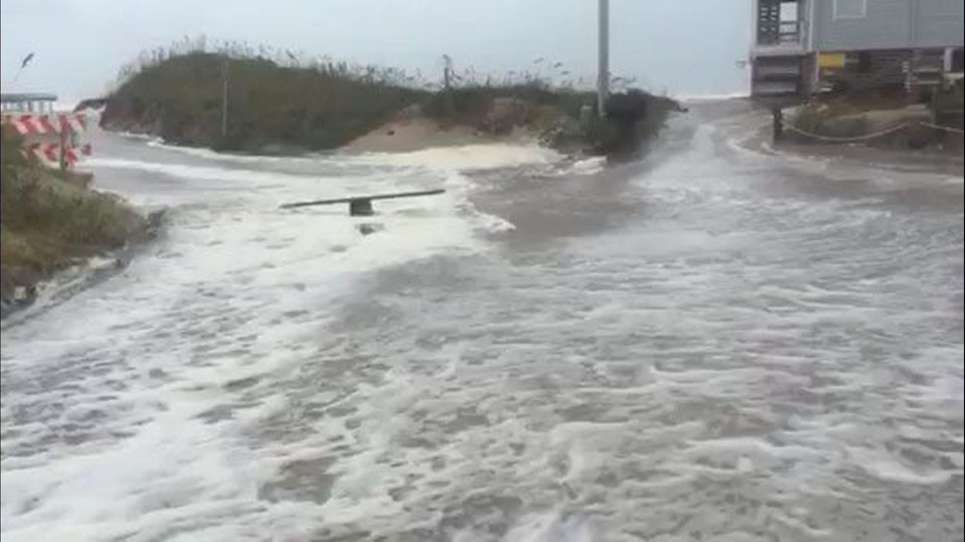 Water pours across and Down Seabreeze Drive in Kinnakeet, N.C. (south of Rodanthe) on September 13, 2018. Video courtesy Tim Fitch