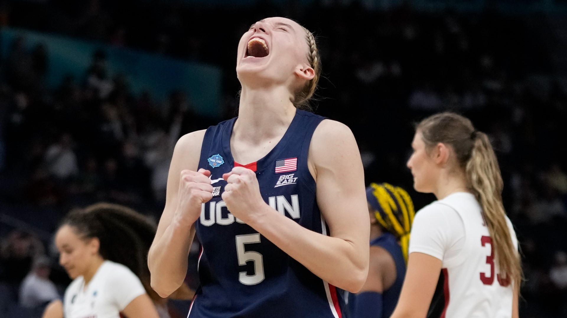 Paige Bueckers scored 14 points and UConn advanced to the national championship game with a 63-58 win over defending champion Stanford on Friday night.