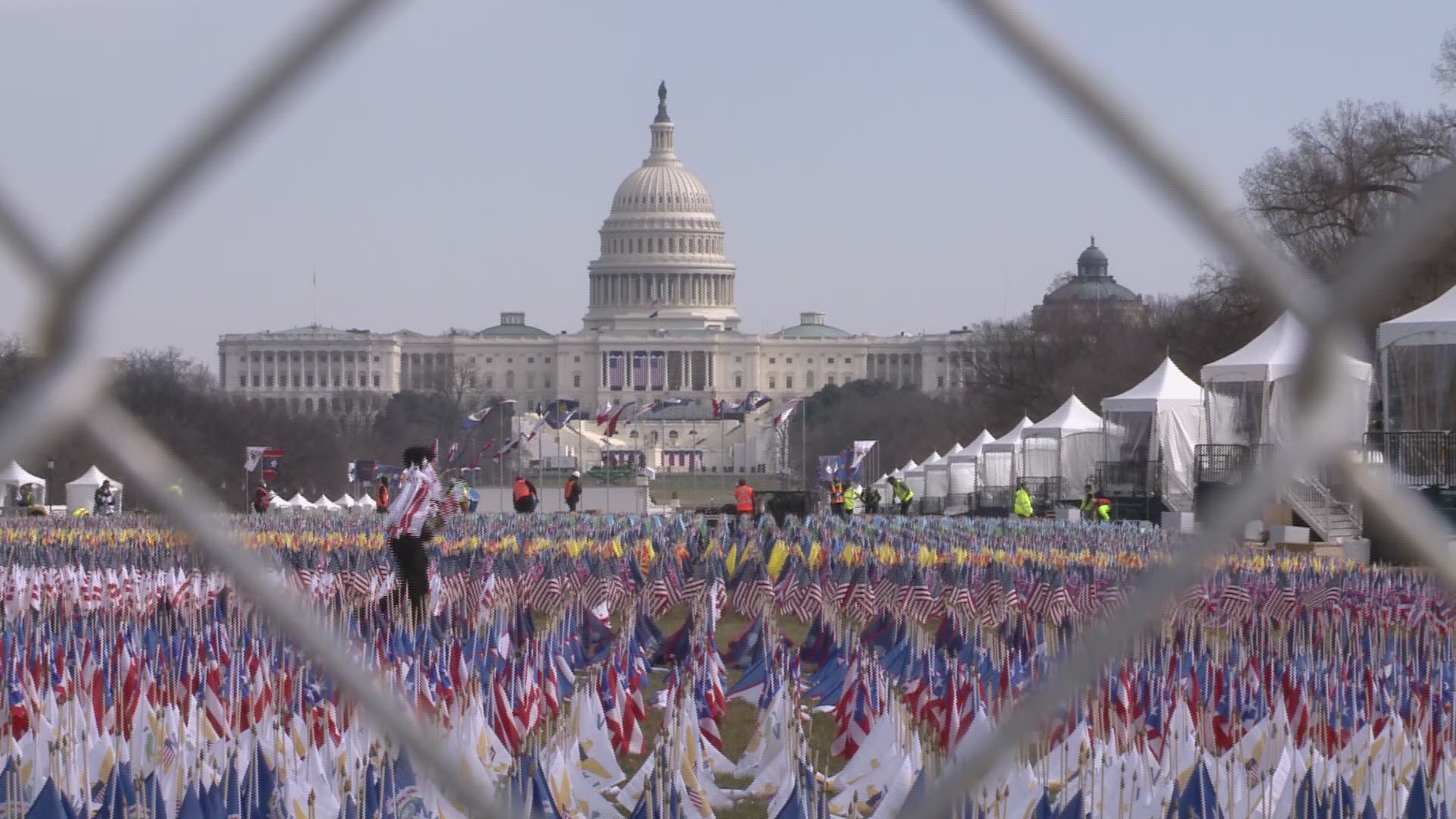 The “Field of Flags” installation, a display of 200k  flags on the National Mall are removed a day after President Joe Biden's Inauguration.