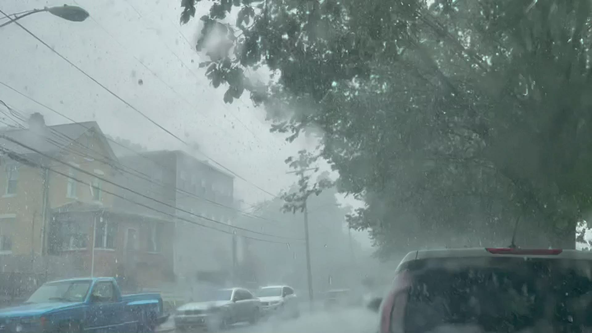 Heavy rain and hail falls in SE DC near the intersection of 4th St and Valley Ave.