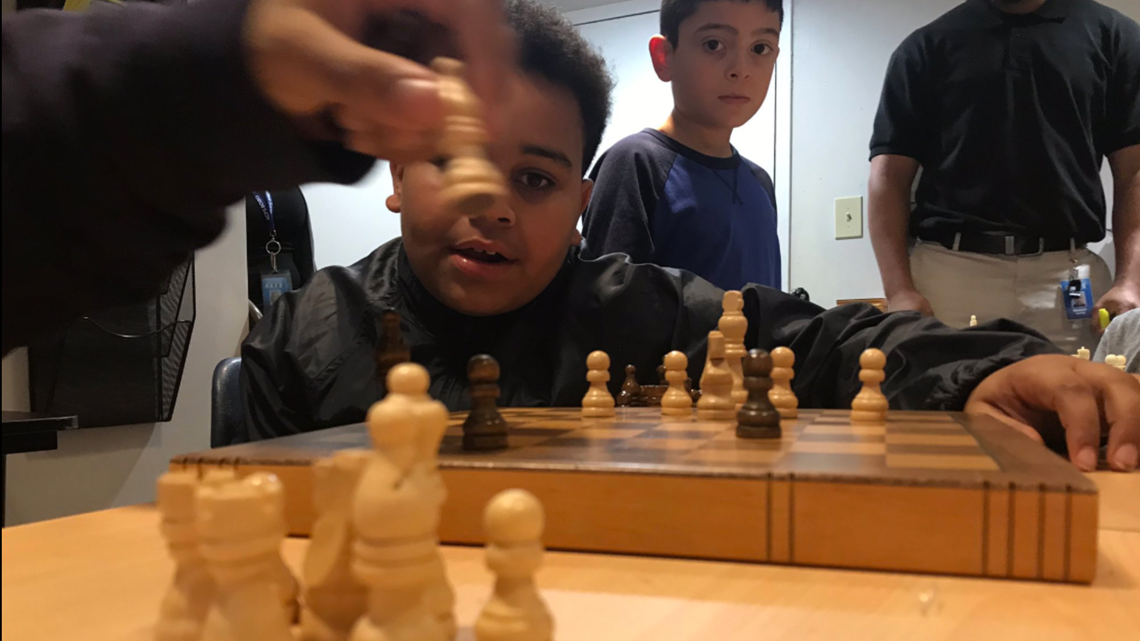 a brazilian teenage astronaut playing chess - Playground