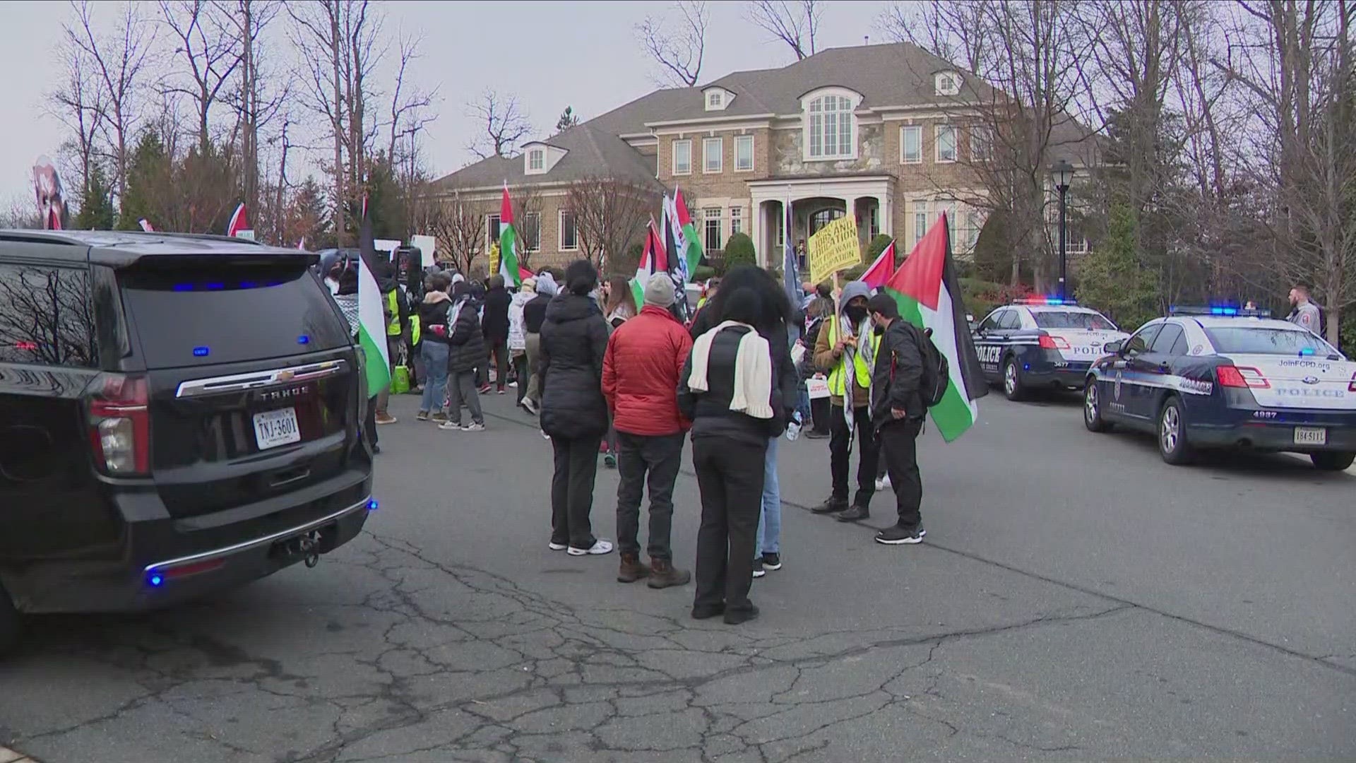 Later that day in Northwest DC, the same group of protesters gathered outside the home of White House National Security advisor, Jake Sullivan