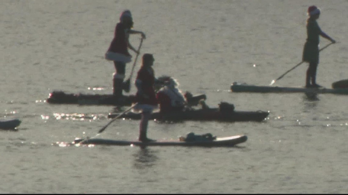 Santa and helpers paddle out on the Potomac River