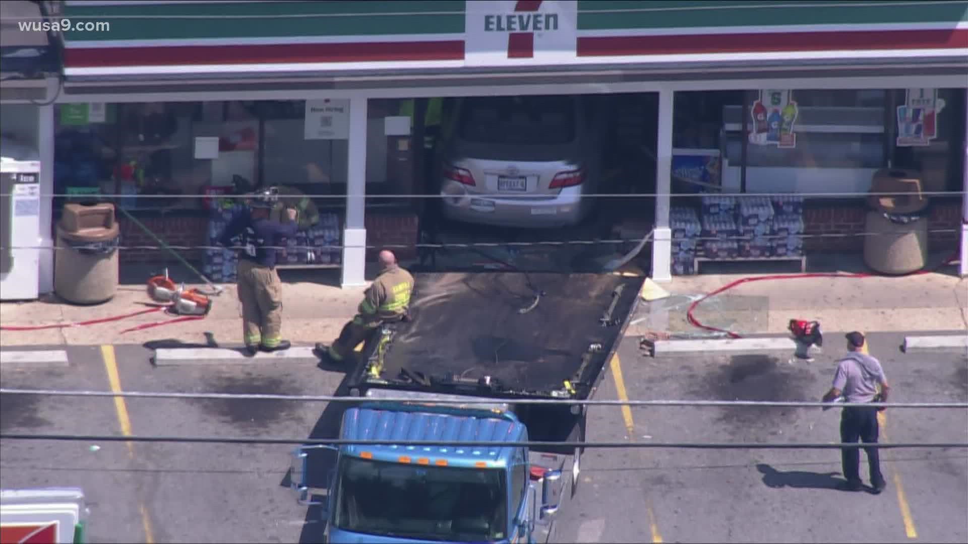 WUSA9 Sky9 is on the scene of a car that crashed into the store front of a 7-Eleven in Alexandria, Va.