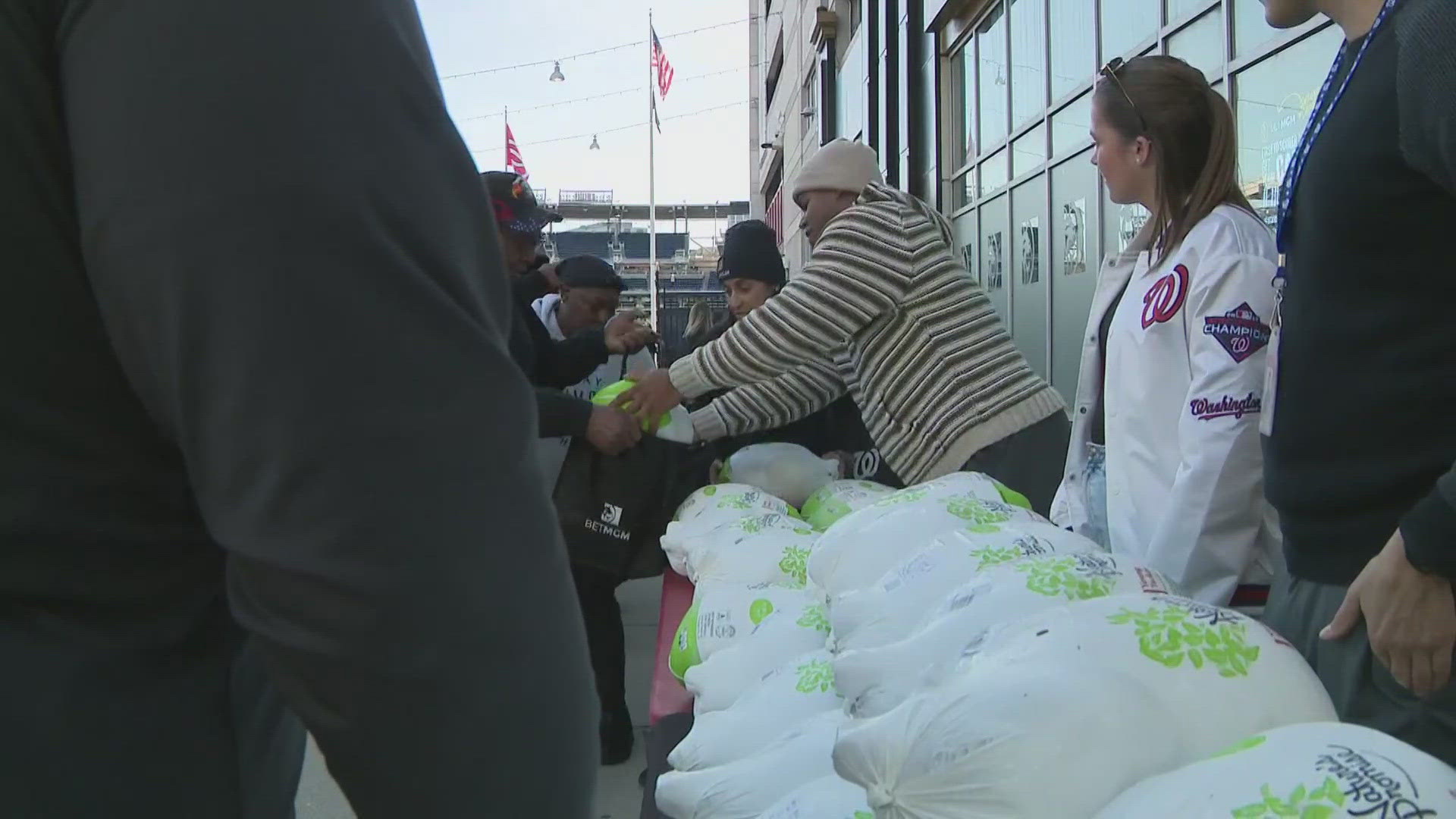 Volunteers from the Nationals front office and from Bet MGM distributed about 1,200 turkeys, as well as fresh produce and other goodies.