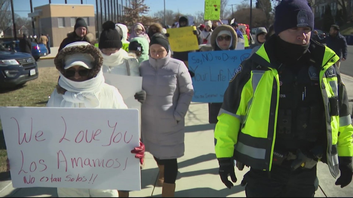 Families march to call for change, support after student dies of apparent drug overdose