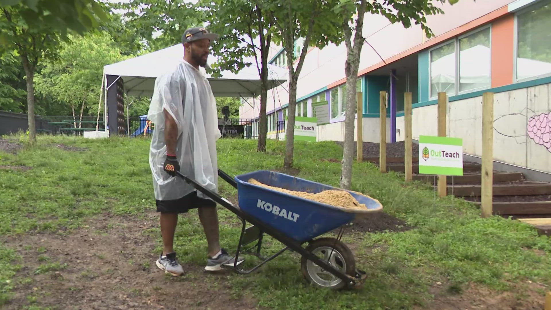 SANTANA MOSS MOVING DIRT, HELPING OUT WITH A GARDEN BUILD IN WARD 8. THERE WAS ALSO A FOOTBALL CLINIC AT HD WOODSON HIGH SCHOOL. JAYDEN DANIELS WAS IN THE SPIRIT.