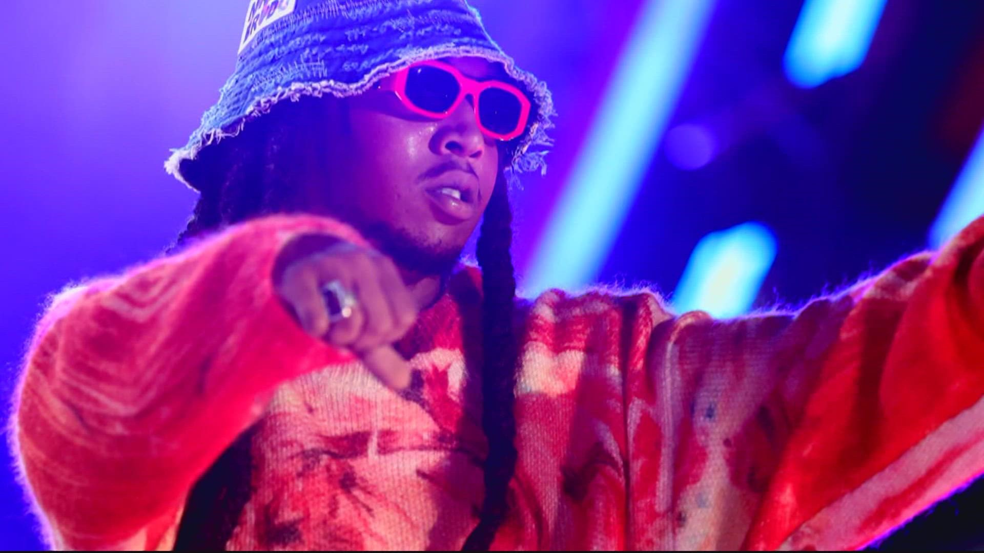 A 33-year-old man was arrested on a murder charge in the shooting of rapper Takeoff, who police on Friday said was an “innocent bystander” when he was shot.