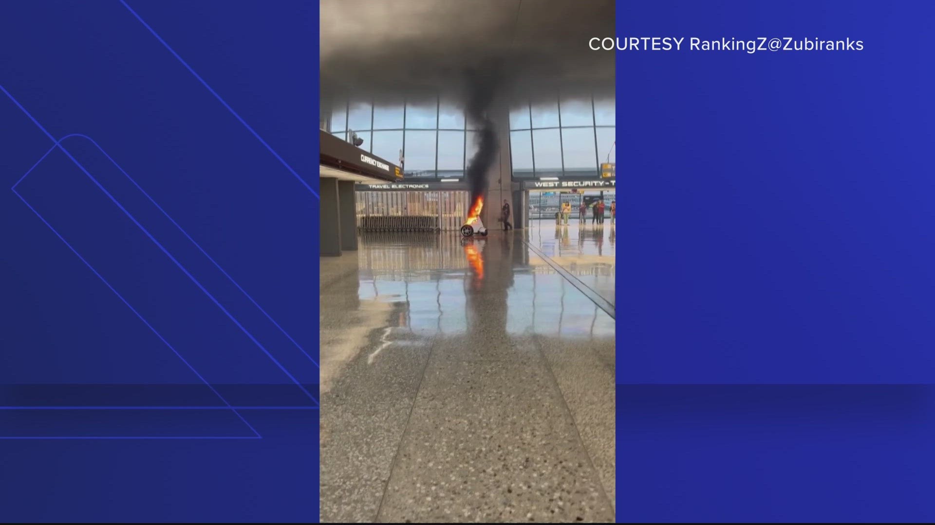 A small motorized police vehicle caught fire in the terminal on Saturday.