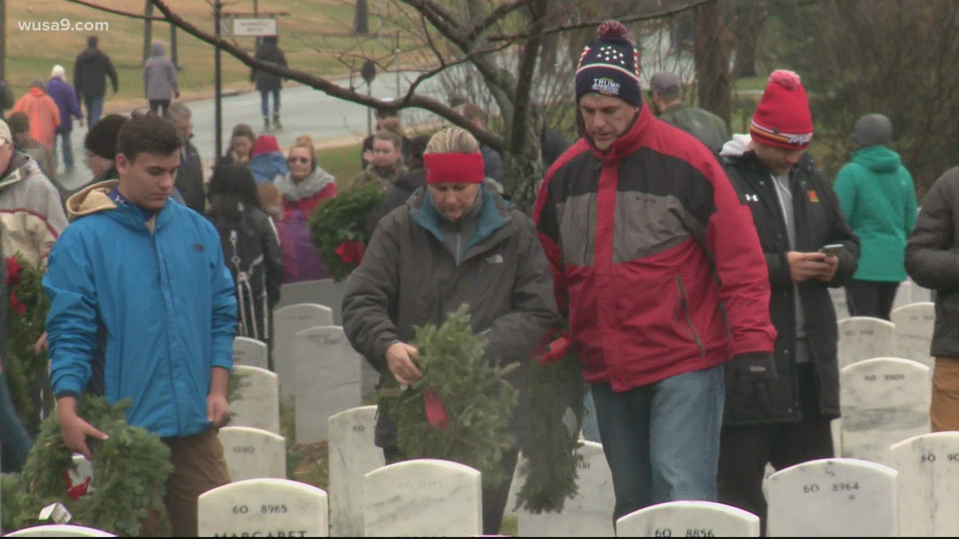 Hundreds of thousands of wreaths were placed on graves Saturday as part of Wreaths Across America.