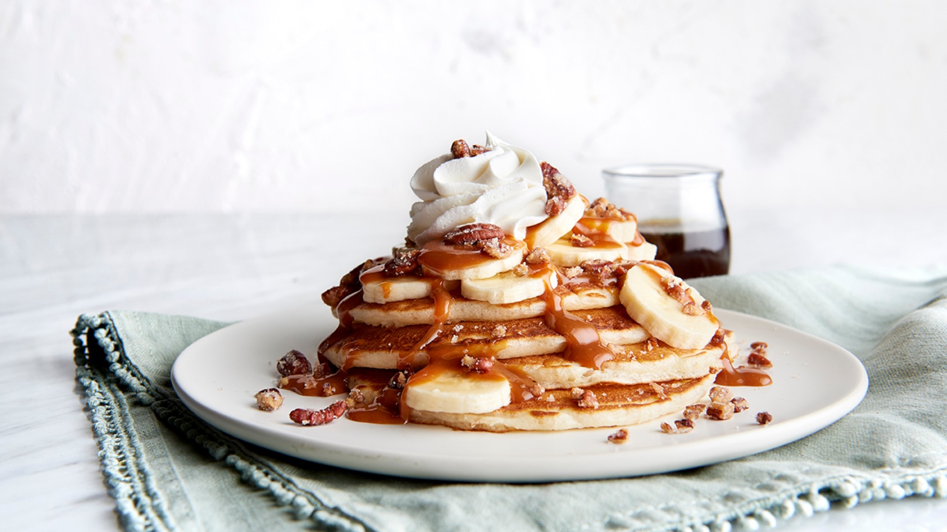 Celebrate National Pancake Day with Corner Bakery's tasty banana foster