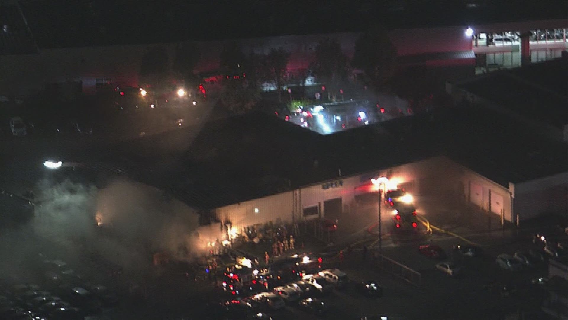 Crews worked Tuesday night to put out a large fire at a Maryland car dealership.