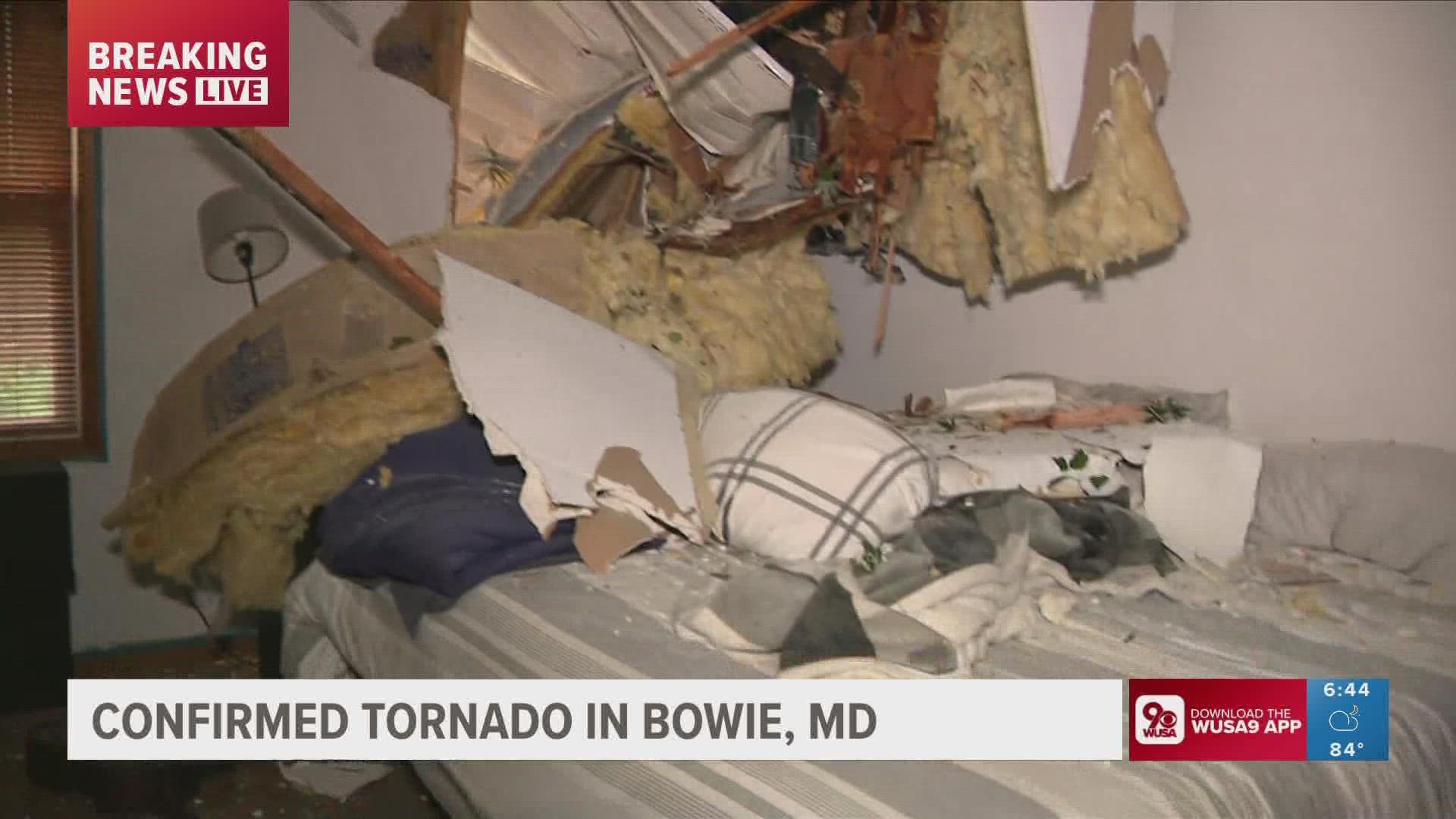 A home in Bowie is damaged after a tree fell into the residence during a tornado.