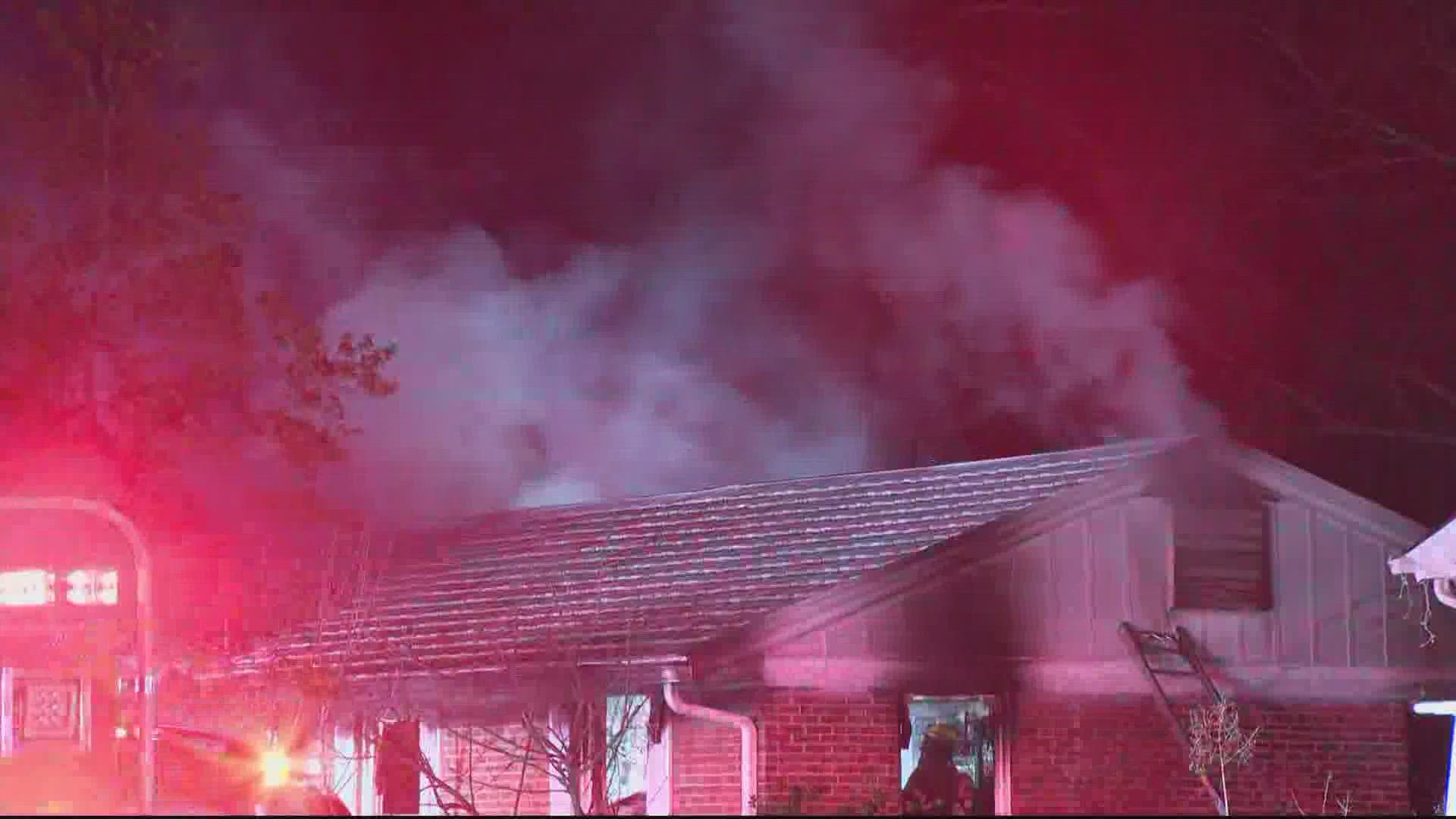 Two people were killed and three firefighters were injured after a fire rips through a family house in Temple Hills, Maryland.