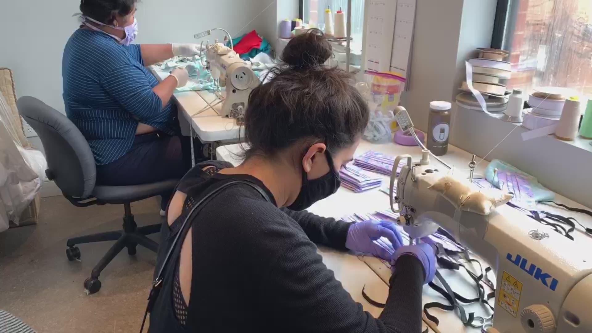 Employees with Carine's Bridal shop are sewing masks for hospital staff