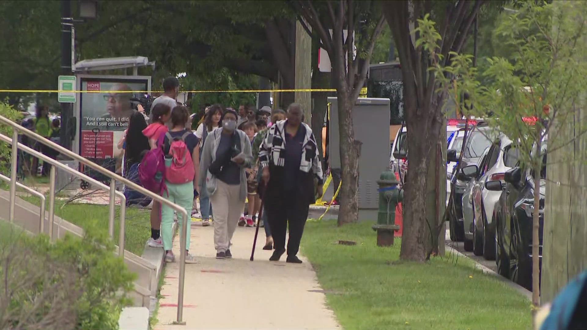 Police are investigating a shooting near Charles Young Elementary and Spingarn High after finding a man unconscious. 