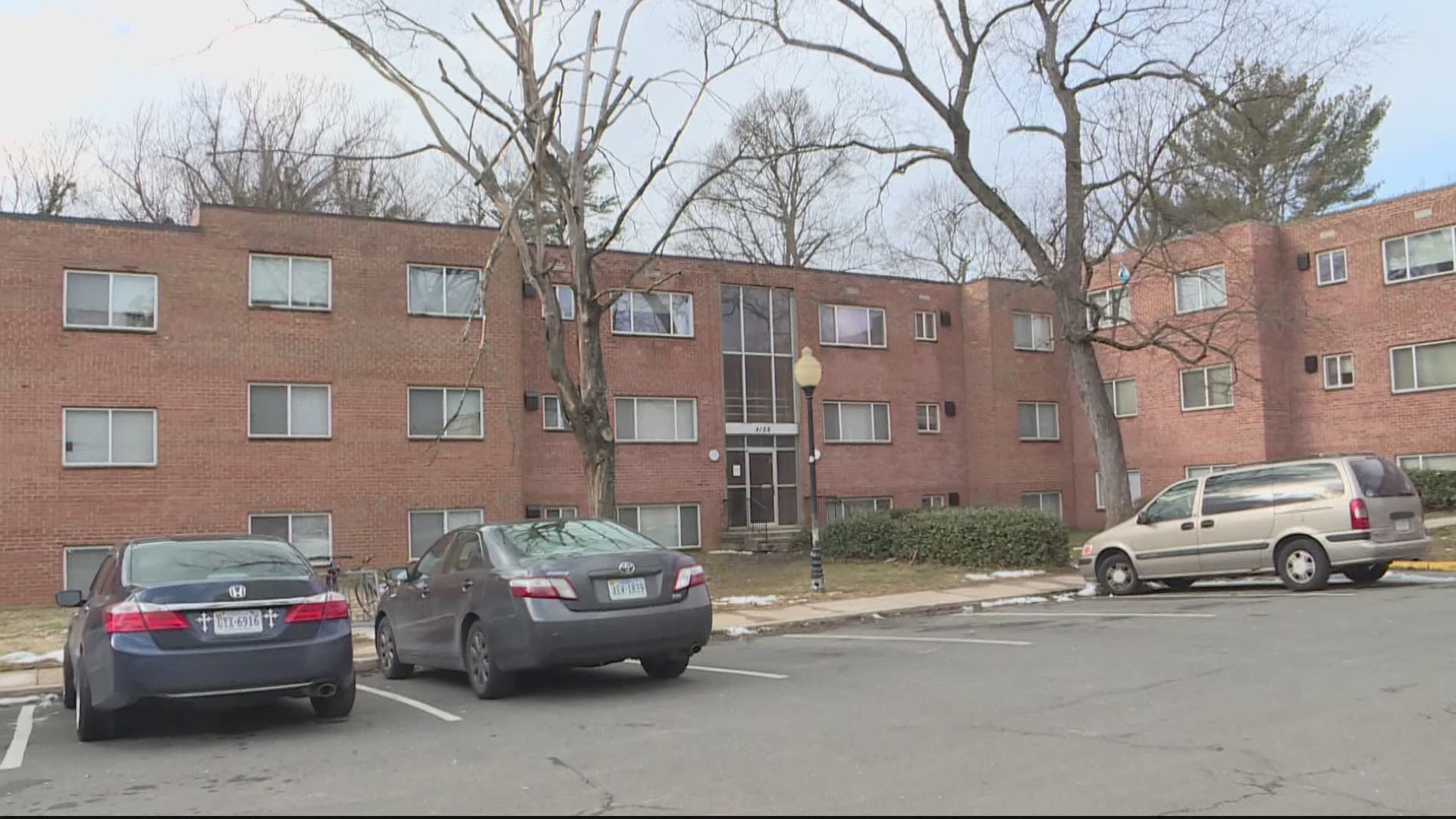 Fairfax County police say detectives are searching for a group of suspects that shot at the two outside an apartment building Friday night.