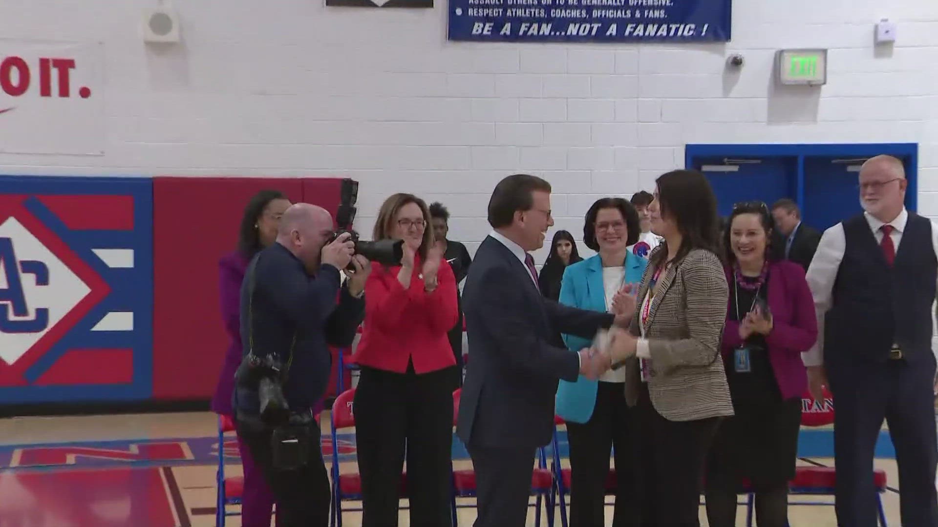 The Alexandria City High School teacher won the Milken Educator Award, and $25,000.