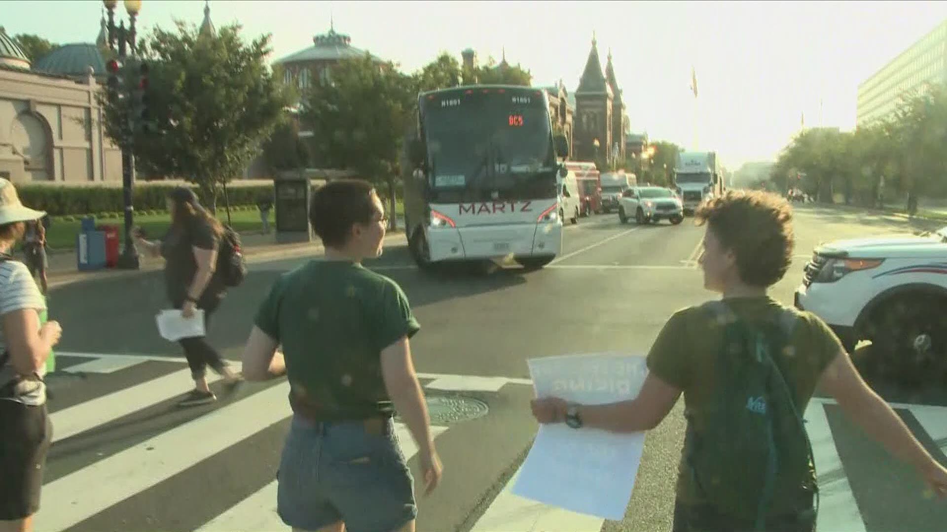 Climate change protesters block Independence  Ave. causing traffic.