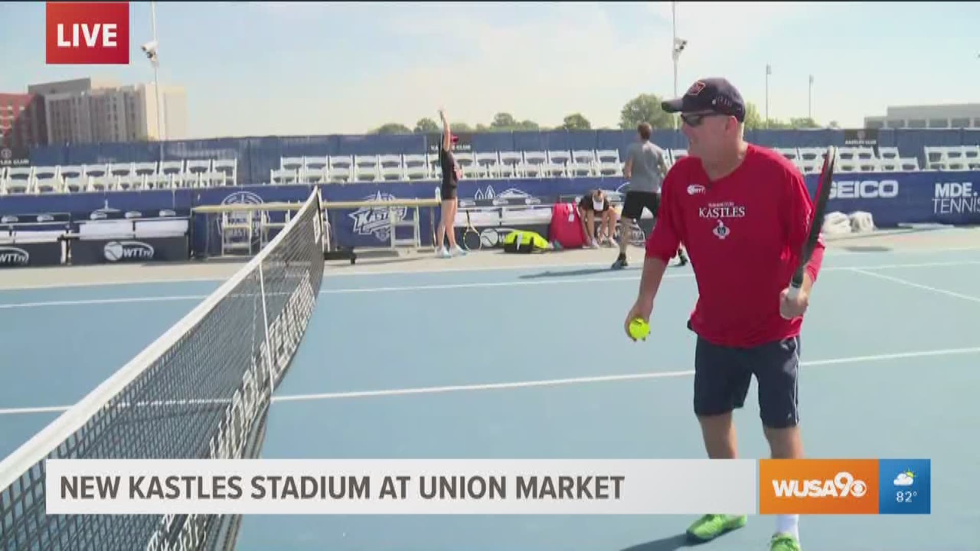 Andi plays a friendly match with Coach Macpherson at the new Washington Kastles stadium.