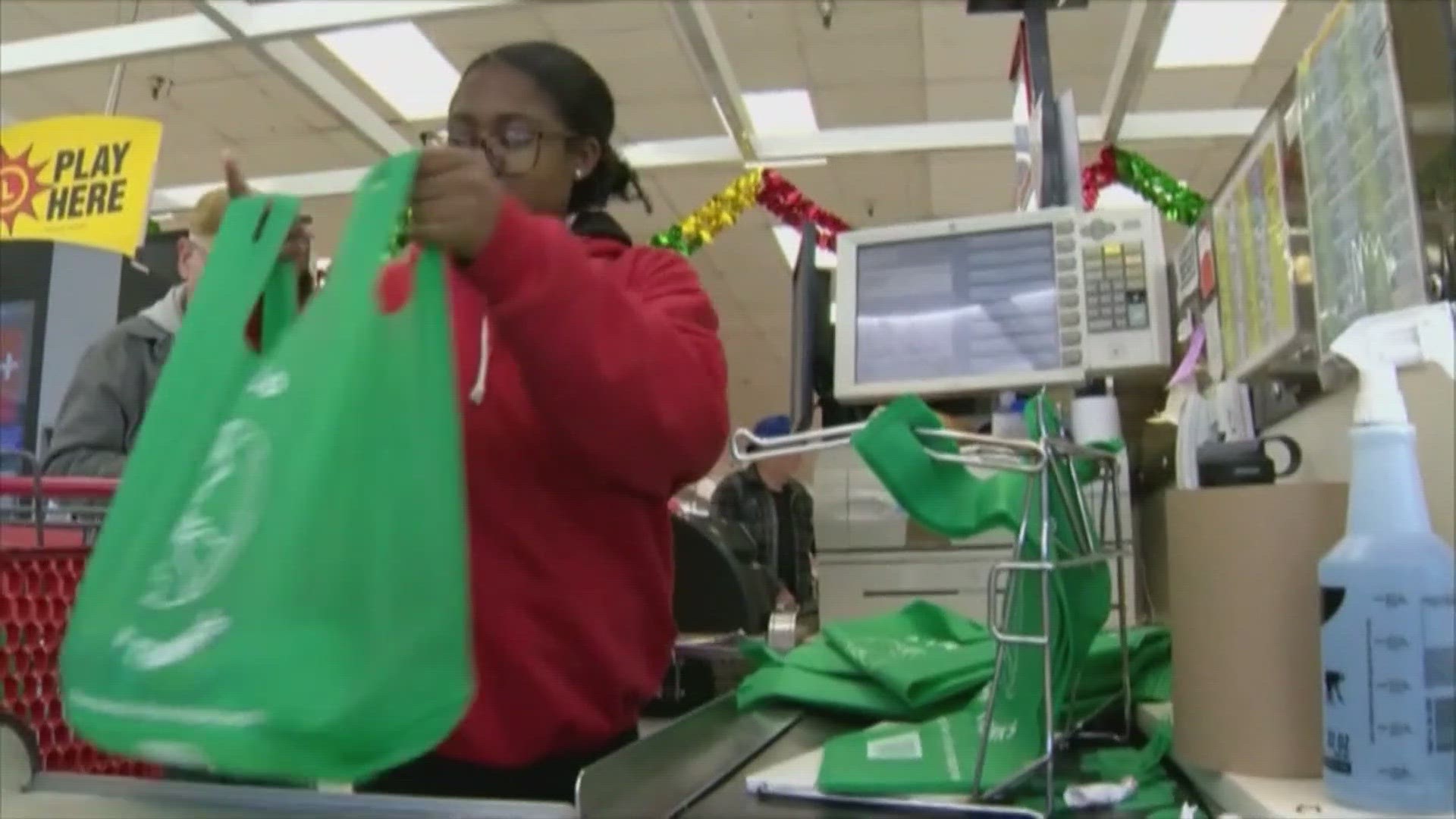 Plastic bags are no longer available at grocery stores there and paper bags will cost you $0.10