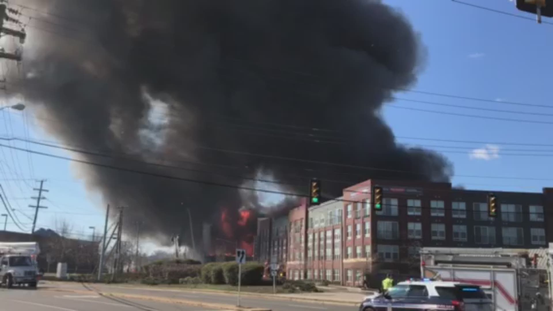 No firefighter or civilian injuries have been reported in the fire of the five-story building. Thick smoke was visible all across the DMV.
