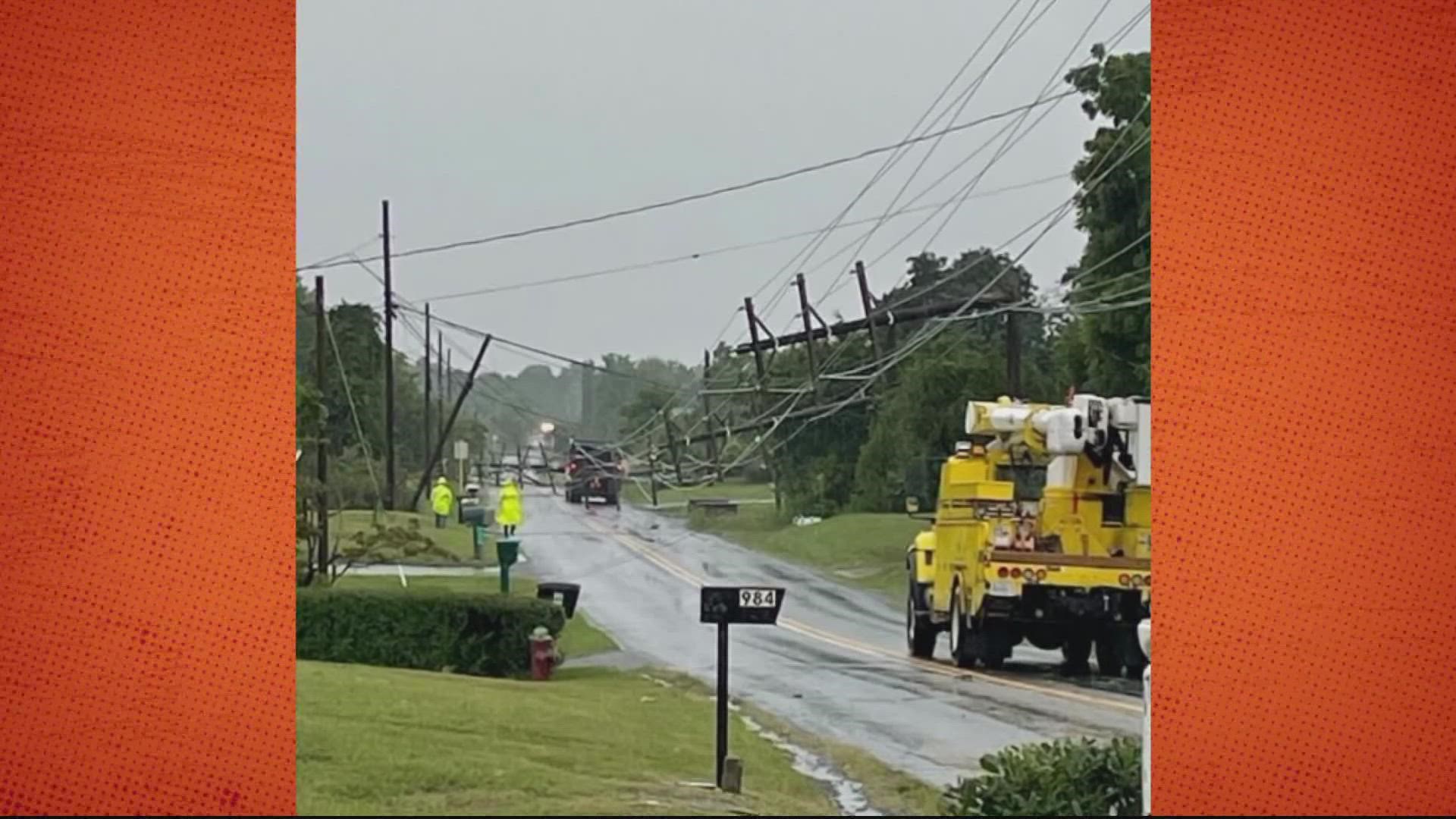 Crews worked through the night to restore power after storm down poles ...